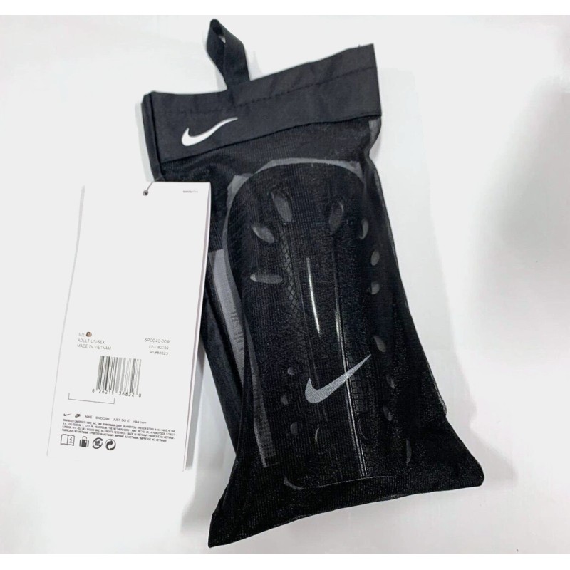 CANILLERA NIKE J GUARD NEG SP0040 009